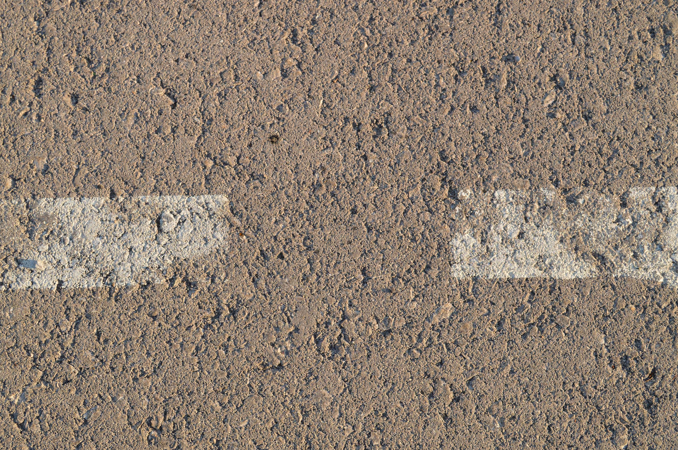 Asphalt with two white lines by Mish-A-Man